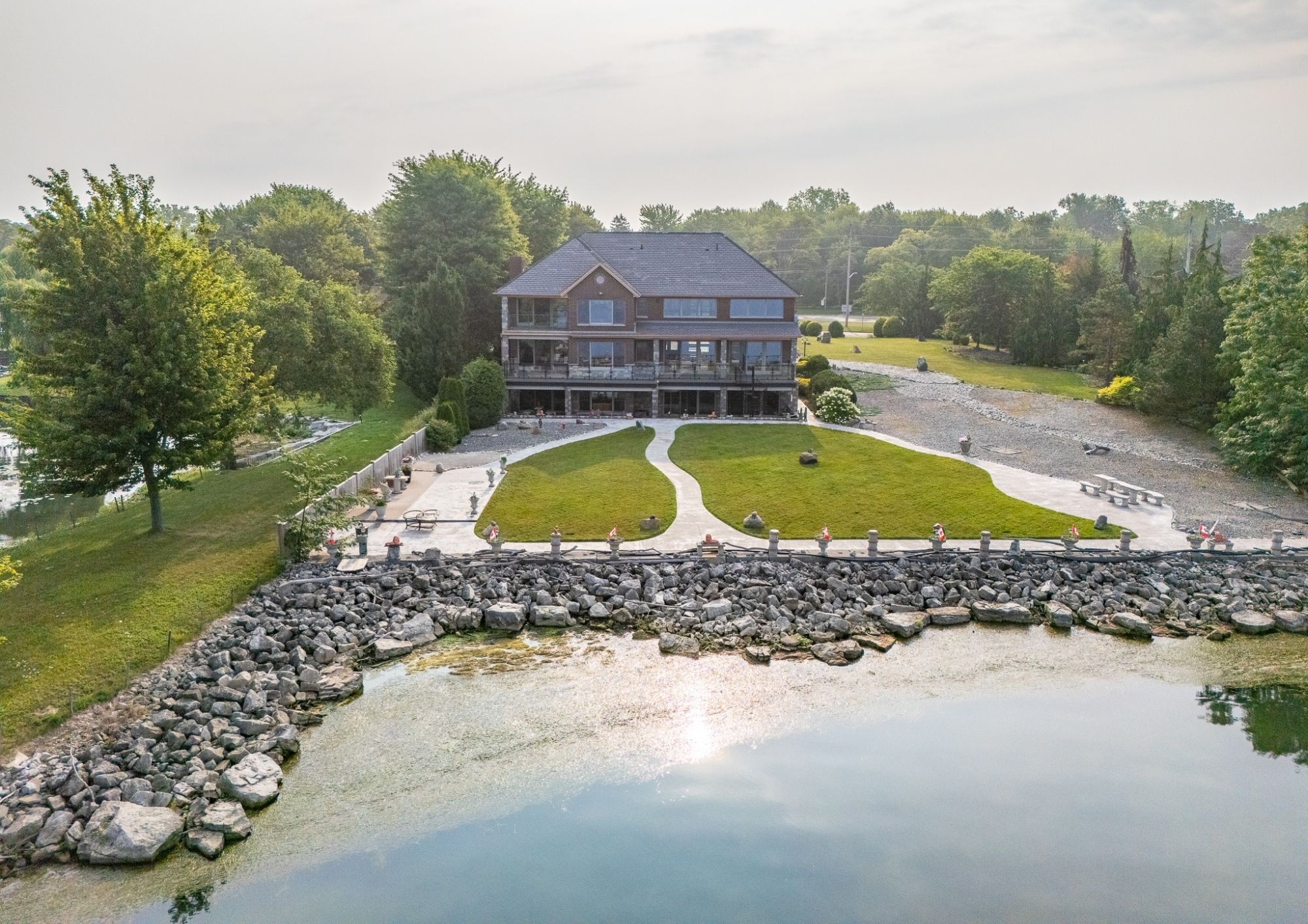 Drone view of the waterfront setting at 1360 Windermere Place