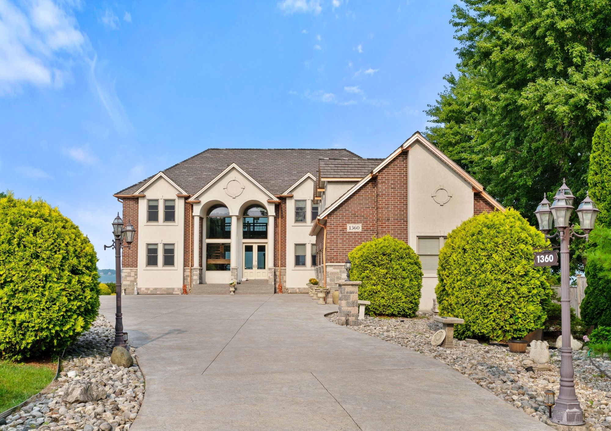 Exterior view of the riverfront home at 1360 Windermere Place