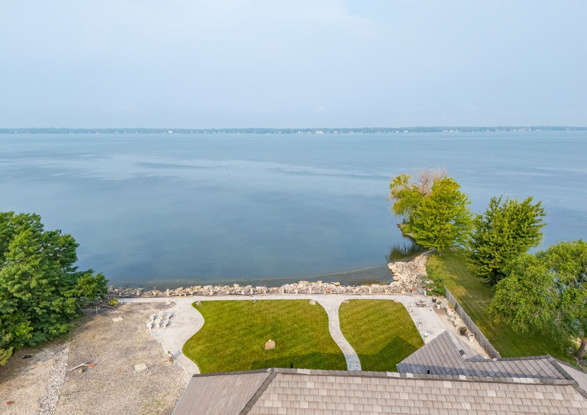 Exterior aerial view of the riverfront property at 1360 Windermere Place